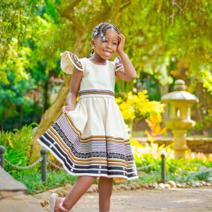 Cream, black and mustard girls dress