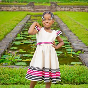 Cream, black and cerise pink girls dress