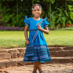 Turquoise,  black and white puff sleeve girls dress